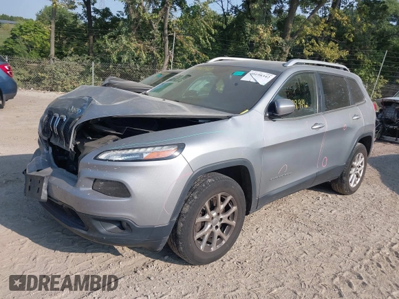 2016 Jeep Cherokee Altitude with VIN 1C4PJMCB0GW108819, listed as a IAAI auction lot 40198342 with 128,949 mi miles and . Bid and sale history available at DreamBid. Image 2.