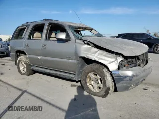 2000 GMC Yukon SLE with VIN 1GKEK13T2YJ130870, listed as a Copart auction lot 82887054 with 310,765 mi miles and Salvage Title. Bid and sale history available at carsss.com. Image 4.