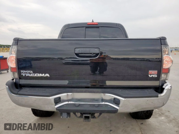 2014 Toyota Tacoma with VIN 3TMLU4EN4EM140862, listed as a Copart auction lot 55147955 with 128,615 mi miles and Clean Title. Bid and sale history available at DreamBid. Image 6.