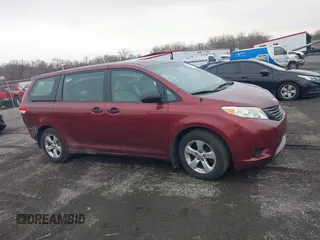 2014 Toyota Sienna L with VIN 5TDZK3DC8ES477402, listed as a IAAI auction lot 41494073 with 102,063 mi miles. Bid and sale history available at carsss.com. Image 13.