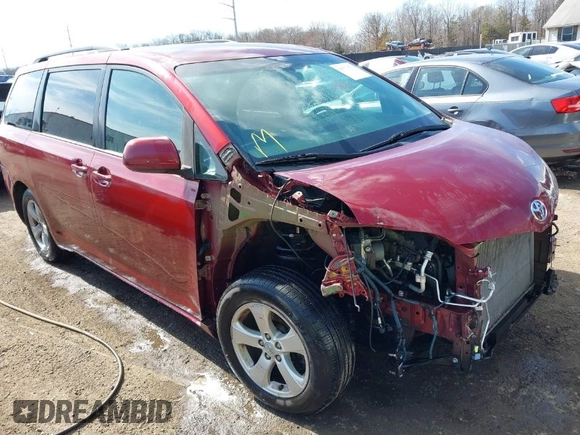 2015 Toyota Sienna LE AAS with VIN 5TDKK3DC9FS546455, listed as a IAAI auction lot 41674823 with 94,941 mi miles. Bid and sale history available at carsss.com. Image 1.
