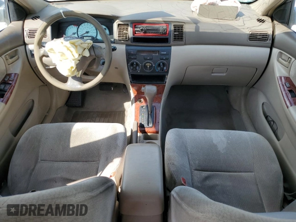 2004 Toyota Corolla CE with VIN 1NXBR32E74Z240293, listed as a Copart auction lot 52624445 with 299,999 mi miles and Salvage Title. Bid and sale history available at DreamBid. Image 8.