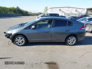 2012 Honda Insight EX z VIN JHMZE2H77CS001370, wystawiony jako IAAI lot #42312077 z przebiegiem 134 249 mil mil oraz . Historia ofert i sprzedaży dostępna na DreamBid. Obrazek 15.