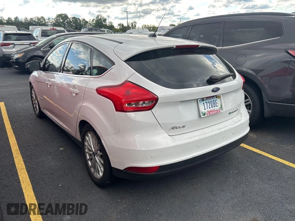 2016 Ford Focus Electric z VIN 1FADP3R47GL320483, wystawiony jako IAAI lot #42392319 z przebiegiem 74 612 mil mil oraz . Historia ofert i sprzedaży dostępna na DreamBid. Obrazek 24.