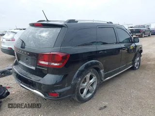 2017 Dodge Journey Crossroad Plus with VIN 3C4PDCGB3HT556863, listed as a IAAI auction lot 41629766 with 105,079 mi miles. Bid and sale history available at carsss.com. Image 4.