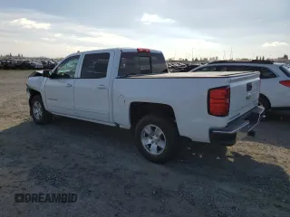 2018 Chevrolet Silverado 1500 LT with VIN 3GCPCREC8JG603045, listed as a Copart auction lot 50166665 with 96,324 mi miles and Salvage Title. Bid and sale history available at DreamBid. Image 2.