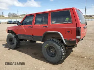 1999 Jeep Cherokee Sport with VIN 1J4FF68S6XL574980, listed as a Copart auction lot 51639635 with 257,854 mi miles and Salvage Title. Bid and sale history available at carsss.com. Image 2.