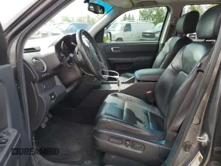 2013 Honda Pilot EX-L z VIN 5FNYF4H77DB035961, wystawiony jako Copart lot #57903095 z przebiegiem 193 387 mil mil oraz Szkoda całkowita • Salvage title. Historia ofert i sprzedaży dostępna na DreamBid. Obrazek 7.