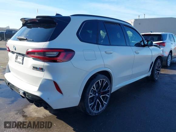 2022 BMW X5 M with VIN 5YMJU0C02N9K39077, listed as a IAAI auction lot 41711996 with 11,875 mi miles. Bid and sale history available at carsss.com. Image 4.