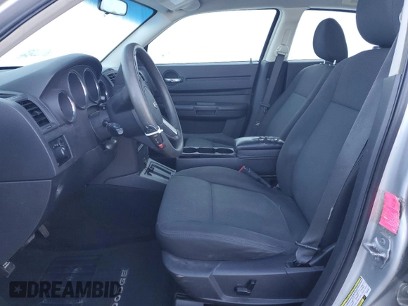 2009 Dodge Charger Police with VIN 2B3KA43TX9H587594, listed as a Copart auction lot 86266084 with 215,829 mi miles and Salvage Title. Bid and sale history available at DreamBid. Image 7.