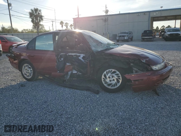 1999 Saturn SL z VIN 1G8ZK5278XZ173810, wystawiony jako Copart lot #42571425 z przebiegiem 114 580 mil mil oraz Szkoda całkowita • Salvage title. Historia ofert i sprzedaży dostępna na DreamBid. Obrazek 4.