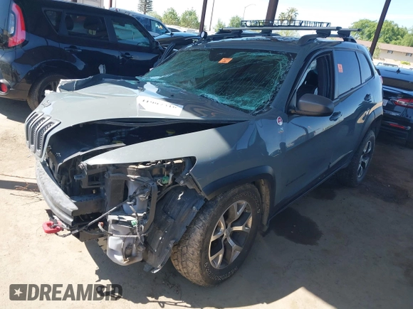 2014 Jeep Cherokee Trailhawk with VIN 1C4PJMBS5EW134900, listed as a IAAI auction lot 41997316 with 96,445 mi miles. Bid and sale history available at carsss.com. Image 17.