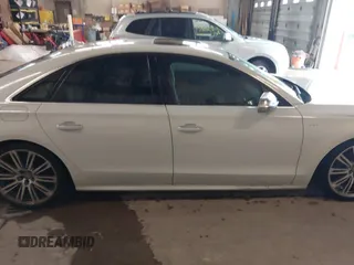2013 Audi S8 z VIN WAUD2AFD7DN008887, wystawiony jako IAAI lot #42314337 z przebiegiem 155 978 mil mil oraz . Historia ofert i sprzedaży dostępna na DreamBid. Obrazek 13.