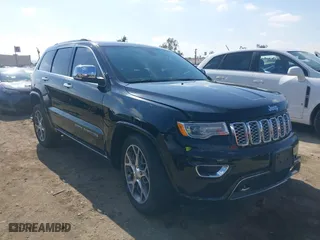 2019 Jeep Grand Cherokee Overland with VIN 1C4RJECG4KC556145, listed as a IAAI auction lot 41555207 with 59,630 mi miles. Bid and sale history available at carsss.com. Image 1.