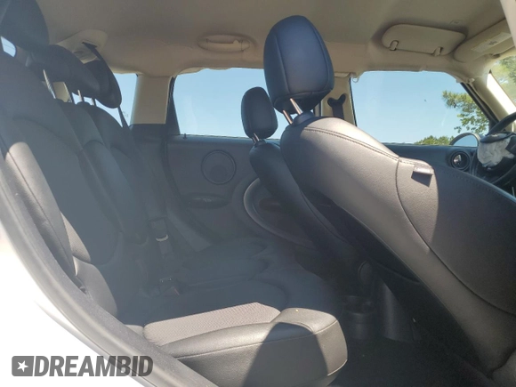 2016 MINI Countryman S with VIN WMWZC5C51GWU00690, listed as a Copart auction lot 55077095 with 104,176 mi miles and Salvage title. Bid and sale history available at DreamBid. Image 10.