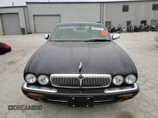 1999 Jaguar XJ z VIN SAJKD6043XC872105, wystawiony jako Copart lot #86270724 z przebiegiem Nie podano mil oraz Szkoda całkowita • Salvage title. Historia ofert i sprzedaży dostępna na DreamBid. Obrazek 11.