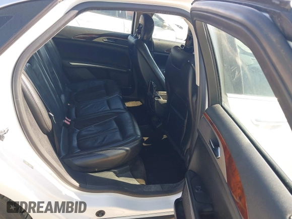 2015 Lincoln MKZ with VIN 3LN6L2G91FR606753, listed as a IAAI auction lot 42693490 with Not provided miles and . Bid and sale history available at DreamBid. Image 8.