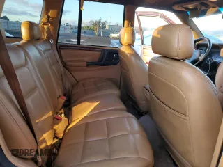 1996 Jeep Grand Cherokee Limited with VIN 1J4GZ78Y3TC182569, listed as a Copart auction lot 80314334 with 302,994 mi miles and Clean Title. Bid and sale history available at carsss.com. Image 11.