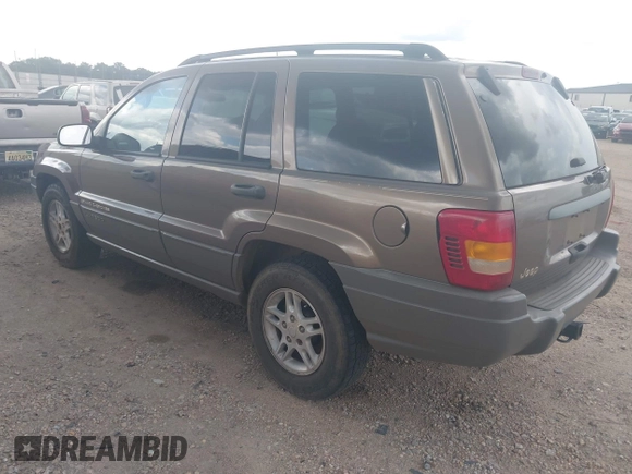 2002 Jeep Grand Cherokee Laredo with VIN 1J4GX48S32C168105, listed as a IAAI auction lot 42451373 with 293,790 mi miles and . Bid and sale history available at DreamBid. Image 3.