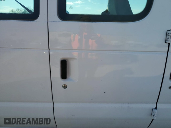 2000 Ford Econoline Passenger XL with VIN 1FBSS31L1YHA76163, listed as a Copart auction lot 88255365 with 60,042 mi miles and Salvage Title. Bid and sale history available at DreamBid. Image 11.