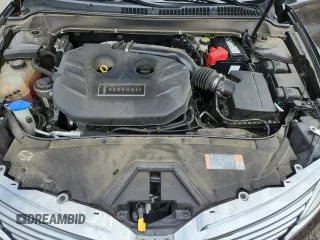 2016 Lincoln MKZ z VIN 3LN6L2G94GR613505, wystawiony jako Copart lot #60842925 z przebiegiem 55 154 mil mil oraz Szkoda całkowita • Salvage title. Historia ofert i sprzedaży dostępna na DreamBid. Obrazek 11.