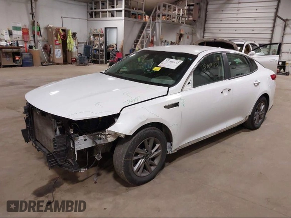 2020 Kia Optima LX with VIN 5XXGT4L33LG382675, listed as a IAAI auction lot 41574386 with 122,732 mi miles and . Bid and sale history available at DreamBid. Image 2.