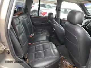 1997 Jeep Grand Cherokee Limited with VIN 1J4GZ78Y3VC568413, listed as a Copart auction lot 86171124 with 104,558 mi miles and Salvage Title. Bid and sale history available at carsss.com. Image 10.