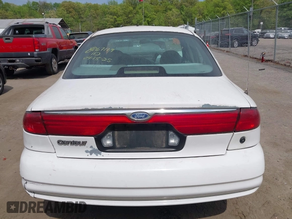 1998 Ford Contour z VIN 1FAFP6537WK249099, wystawiony jako IAAI lot #42112504 z przebiegiem 83 875 mil mil oraz . Historia ofert i sprzedaży dostępna na DreamBid. Obrazek 16.