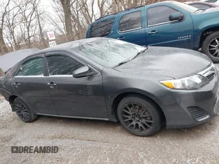 2014 Toyota Camry L z VIN 4T1BF1FK3EU322598, wystawiony jako IAAI lot #41490070 z przebiegiem 101 250 mil mil oraz . Historia ofert i sprzedaży dostępna na DreamBid. Obrazek 14.