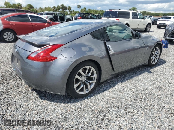 2014 Nissan 370Z with VIN JN1AZ4EH6EM633797, listed as a Copart auction lot 74027354 with Not Provided miles and Salvage Title. Bid and sale history available at DreamBid. Image 3.