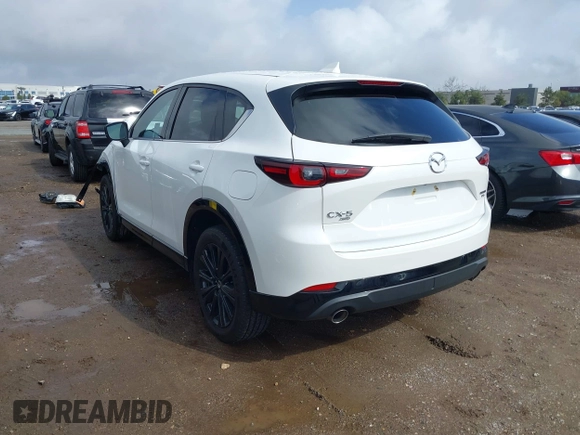 2022 Mazda CX-5 • with VIN JM3KFBAY5N0524251, listed as a IAAI auction lot 41591692 with 28,493 mi miles and . Bid and sale history available at carsss.com. Image 3.