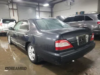 1997 Nissan Maxima with VIN HBY33200347, listed as a Copart auction lot 47182085 with 173,662 mi miles and Salvage title. Bid and sale history available at DreamBid. Image 2.