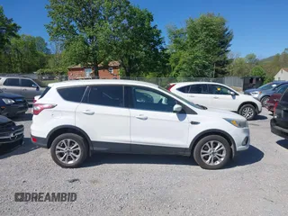 2017 Ford Escape SE with VIN 1FMCU9GD3HUA40233, listed as a IAAI auction lot 42126271 with 284,937 mi miles. Bid and sale history available at carsss.com. Image 14.