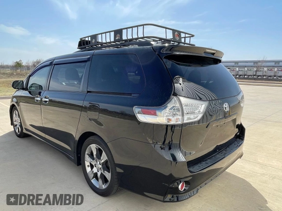2014 Toyota Sienna SE with VIN 5TDXK3DC3ES441544, listed as a Copart auction lot 50452775 with 230,704 mi miles and Clean Title. Bid and sale history available at DreamBid. Image 3.