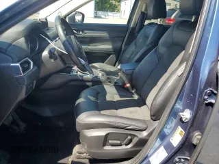 2018 Mazda CX-5 Touring z VIN JM3KFBCM2J1363310, wystawiony jako Copart lot #58969135 z przebiegiem 86 831 mil mil oraz Szkoda całkowita • Salvage title. Historia ofert i sprzedaży dostępna na DreamBid. Obrazek 7.