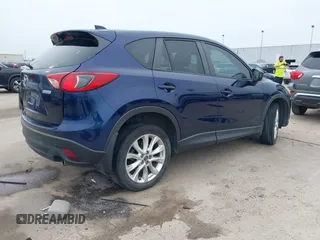 2013 Mazda CX-5 Grand Touring with VIN JM3KE2DE3D0168529, listed as a IAAI auction lot 41884766 with 173,558 mi miles. Bid and sale history available at carsss.com. Image 4.