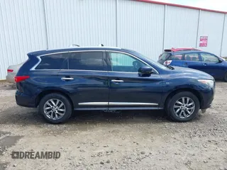 2015 Infiniti QX60 with VIN 5N1AL0MMXFC554836, listed as a IAAI auction lot 42435050 with 115,225 mi miles and . Bid and sale history available at DreamBid. Image 13.