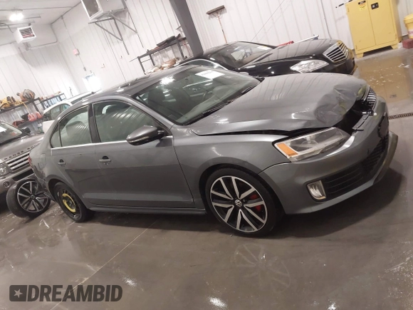 2013 Volkswagen Jetta GLI Autobahn with VIN 3VW467AJ4DM234268, listed as a IAAI auction lot 42006264 with 144,610 mi miles and . Bid and sale history available at DreamBid. Image 14.
