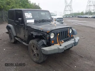 2007 Jeep Wrangler Rubicon with VIN 1J4GA64117L149666, listed as a IAAI auction lot 42252464 with 100,791 mi miles and . Bid and sale history available at DreamBid. Image 6.