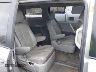 2012 Toyota Sienna XLE with VIN 5TDDK3DC9CS037616, listed as a IAAI auction lot 41435361 with 250,043 mi miles. Bid and sale history available at carsss.com. Image 8.