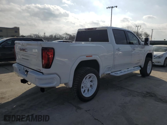 2021 GMC Sierra 2500HD AT4 z VIN 1GT49PEY6MF277074, wystawiony jako Copart lot #49231105 z przebiegiem 77 454 mil mil oraz Czysty tytuł • Clean title. Historia ofert i sprzedaży dostępna na DreamBid. Obrazek 3.