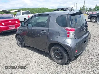 2012 Scion iQ with VIN JTNJJXB00CJ018659, listed as a IAAI auction lot 42232715 with 142,516 mi miles and . Bid and sale history available at DreamBid. Image 3.
