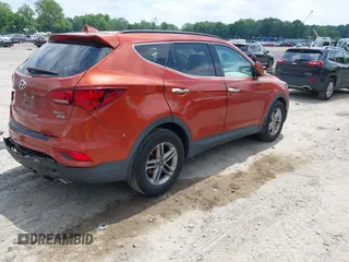 2017 Hyundai Santa Fe 2.4L z VIN 5XYZUDLB1HG463416, wystawiony jako IAAI lot #42546637 z przebiegiem 81 963 mil mil oraz . Historia ofert i sprzedaży dostępna na DreamBid. Obrazek 4.