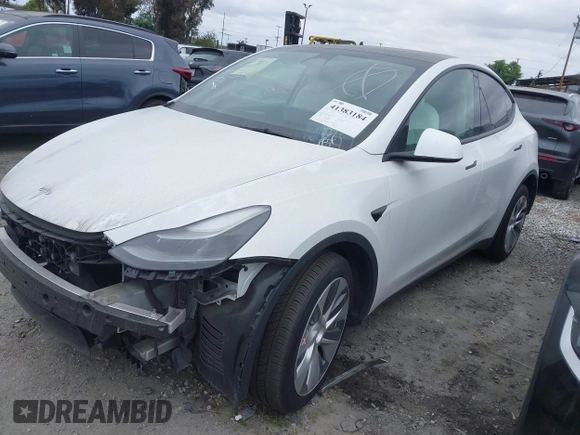 2023 Tesla Model Y Long Range z VIN 7SAYGDEE9PF623285, wystawiony jako IAAI lot #41383184 z przebiegiem 34 092 mil mil oraz . Historia ofert i sprzedaży dostępna na DreamBid. Obrazek 2.