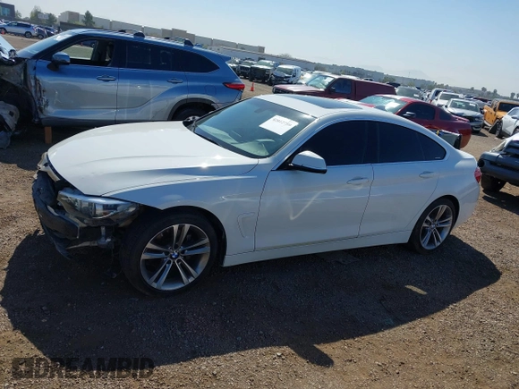 2019 BMW 4 Series 430i with VIN WBA4J1C54KBM18190, listed as a IAAI auction lot 42012759 with 73,598 mi miles. Bid and sale history available at carsss.com. Image 15.