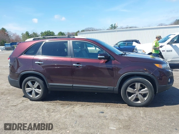 2012 Kia Sorento EX with VIN 5XYKU3A65CG299100, listed as a IAAI auction lot 42098445 with 172,203 mi miles. Bid and sale history available at carsss.com. Image 13.