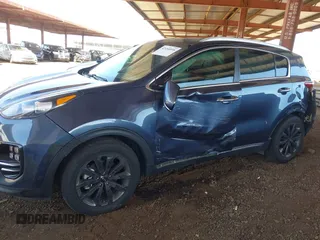 2019 Kia Sportage EX z VIN KNDPN3AC5K7539461, wystawiony jako IAAI lot #42180598 z przebiegiem 69 072 mil mil oraz . Historia ofert i sprzedaży dostępna na DreamBid. Obrazek 6.