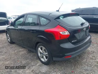 2013 Ford Focus SE with VIN 1FADP3K23DL161448, listed as a IAAI auction lot 41788061 with 184,542 mi miles. Bid and sale history available at carsss.com. Image 3.