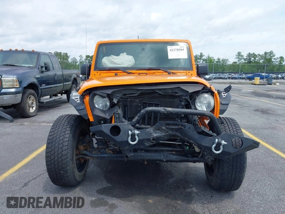 2013 Jeep Wrangler Sport z VIN 1C4AJWAG2DL538526, wystawiony jako IAAI lot #42378501 z przebiegiem 81 709 mil mil oraz . Historia ofert i sprzedaży dostępna na DreamBid. Obrazek 13.