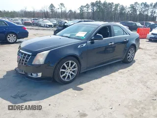 2012 Cadillac CTS Luxury with VIN 1G6DE5E56C0151579, listed as a IAAI auction lot 41717449 with 116,938 mi miles and . Bid and sale history available at DreamBid. Image 2.